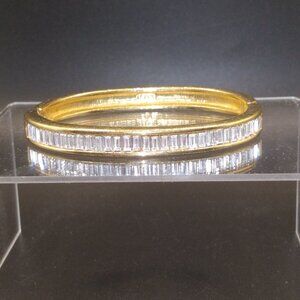 signed S.A.L swarovski Clear Crystal Gold Tone hinged Bangle Bracelet